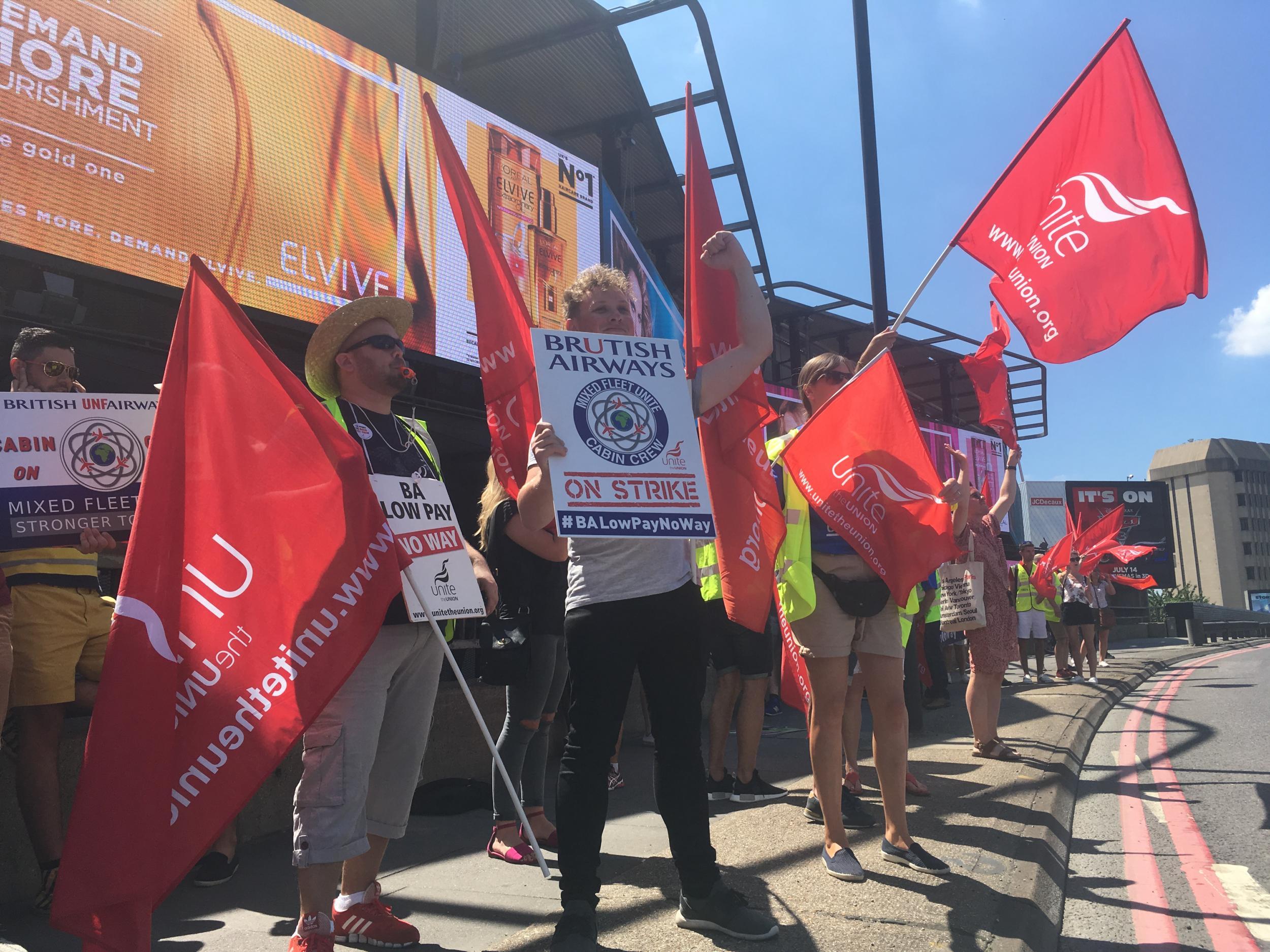 All out: BA cabin crew demonstrating outside Qatar Airways' offices in west London in July 2017