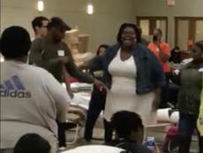 Watch victims of Harvey flooding break into gospel song at shelter