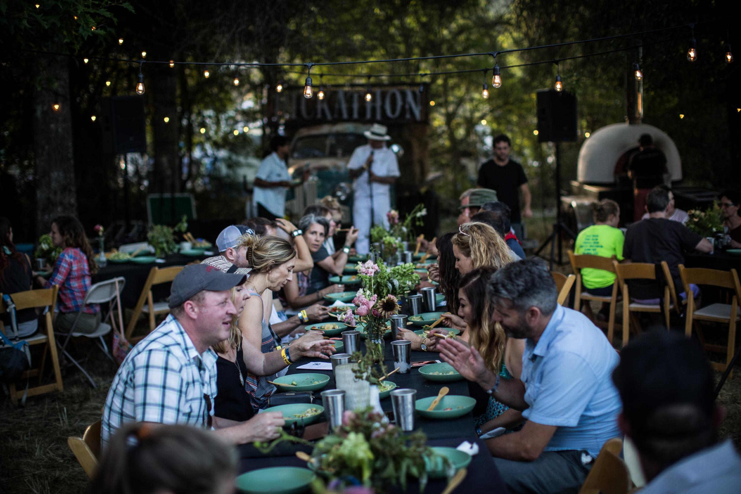 Guests sit down to dinner at the Pickathon Curation Series