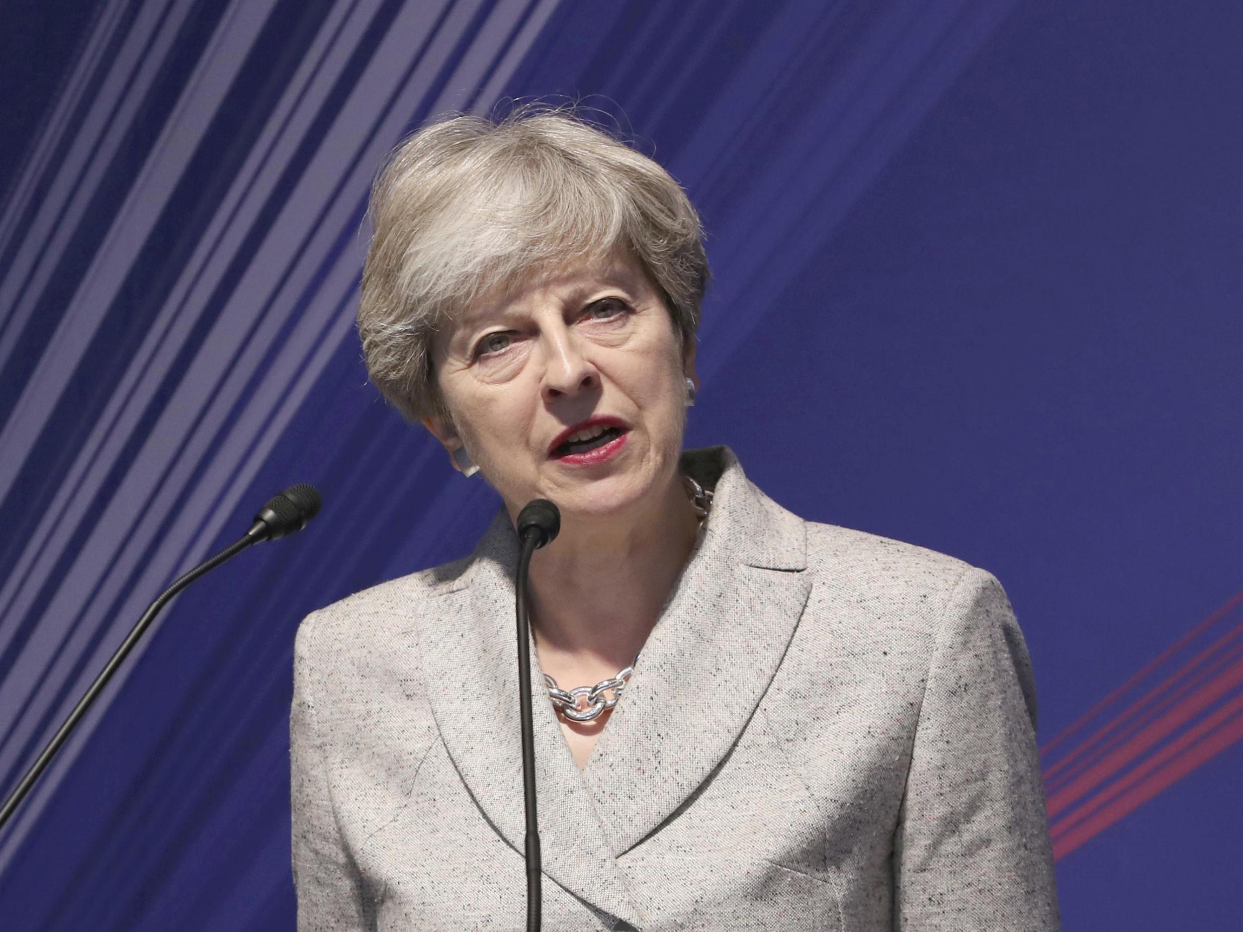 Theresa May delivers a speech at the Japan-UK Business Forum in Tokyo