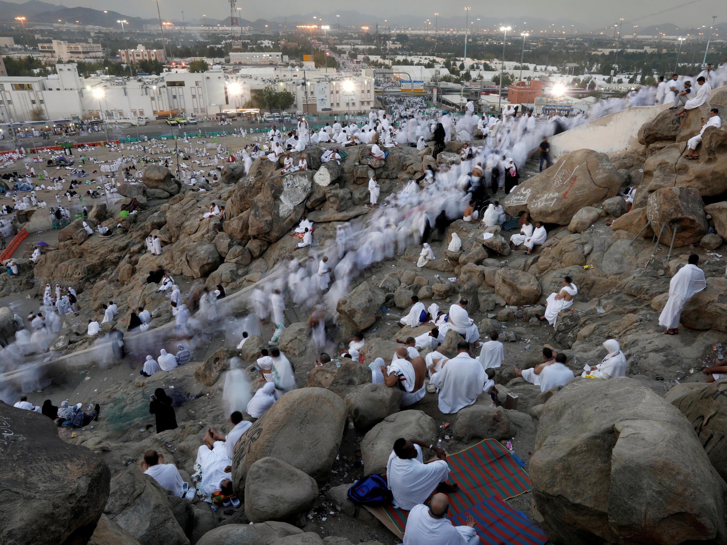 Muslim pilgrims gather on Mount Mercy on the plains of Arafat during the annual hajj pilgrimage outside the holy city of Mecca, Saudi Arabia