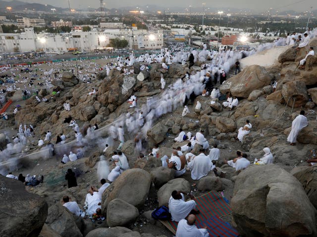 Muslim pilgrims gather on Mount Mercy on the plains of Arafat during the annual hajj pilgrimage outside the holy city of Mecca, Saudi Arabia