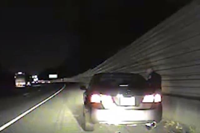 Dash cam video shows officer Greg Abbott speaking to a car passenger in July 2016