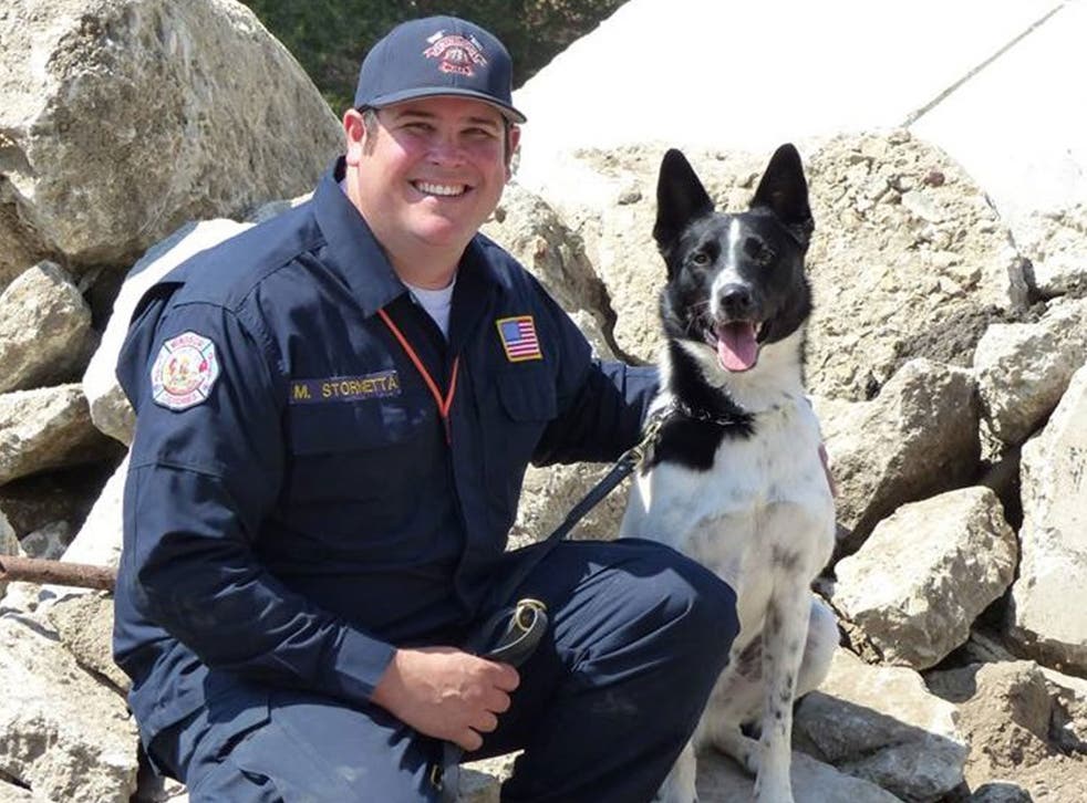Rocket and his handler Mike Stornetta are helping rescue efforts in Texas