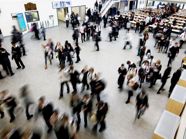Secondary-aged children walking between classes at their school in Glasgow