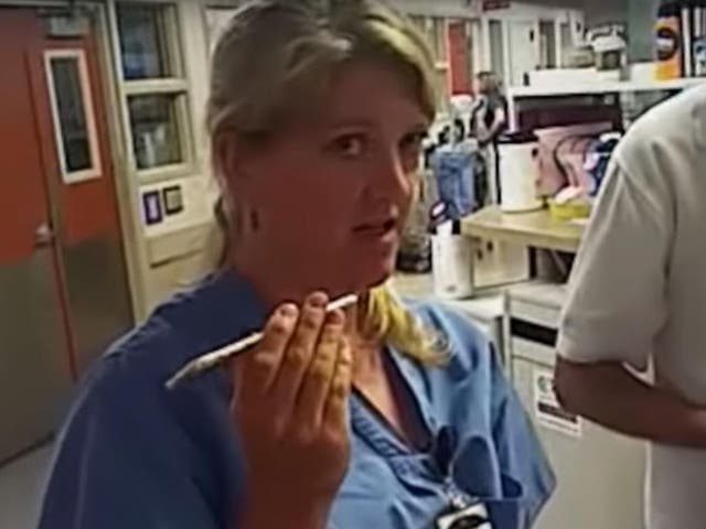 Nurse Alex Wubbels checks the blood test policy with her bosses before her arrest