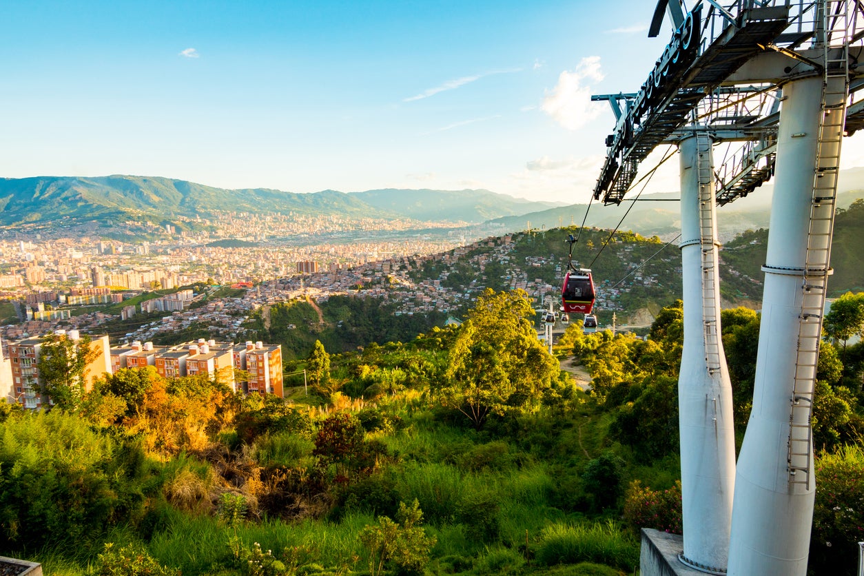 Medellin’s cable cars rise from the valley into the barrios