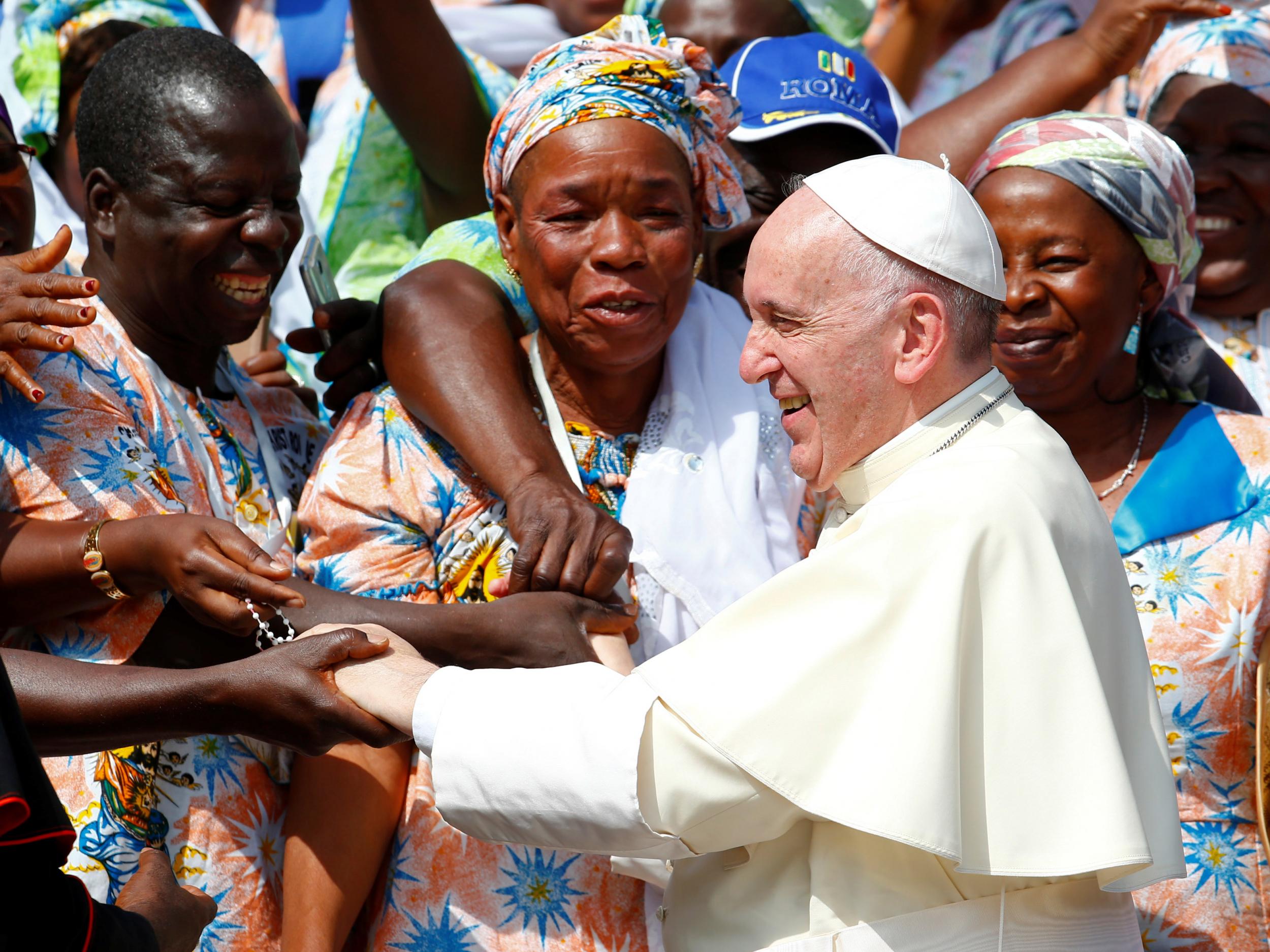 Pope Francis is greeted by pilgrims from Africa during his Wednesday general audience in Saint Peter's square at the Vatican on 30 August 2017
