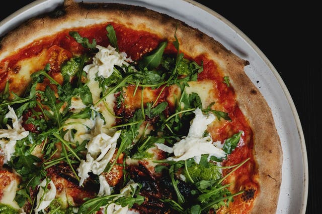 A woodfire pizza by Martello Hall in London