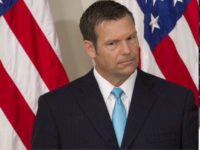 Kansas Secretary of State Kris Kobach is the head of Donald Trump's election fraud commission and also a paid columnist for right-wing Breitbart News 
