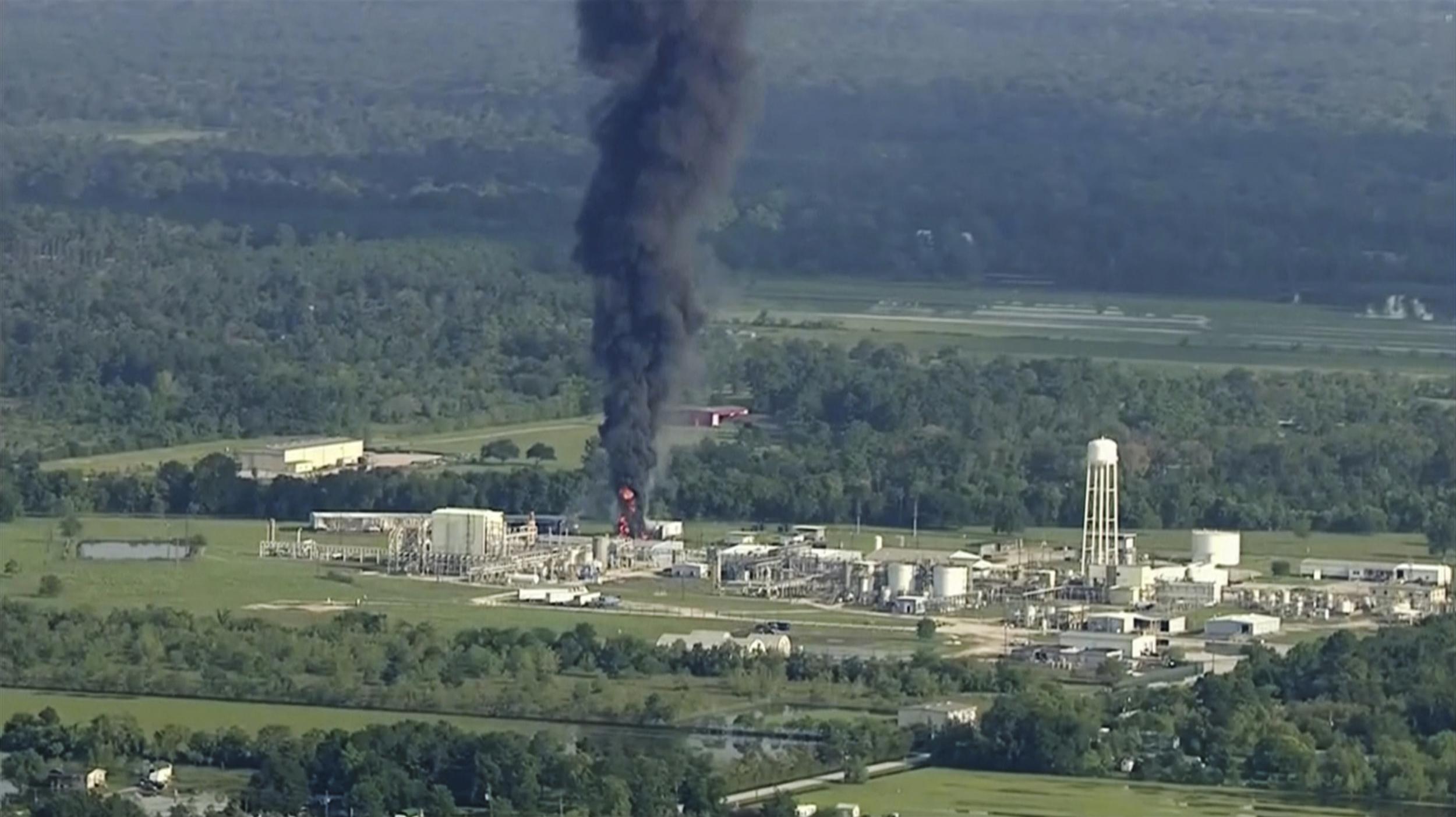 Smoke rises from the flooded Arkema chemical plant north-east of Houston