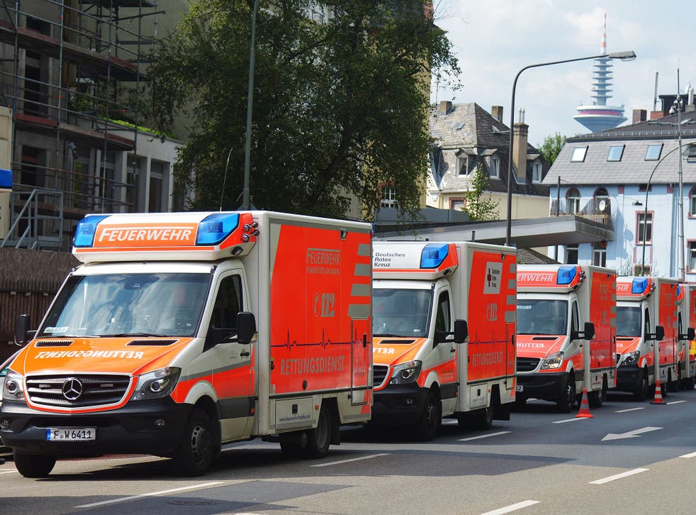 Ambulances queue outside the Buergerhospital in Frankfurt ready to evacuate patients