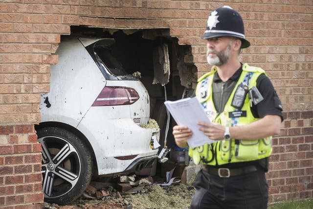The scene in Morehall Close, Clifton, York, after a Volkswagen Golf R left the road and hit a house where a man inside the property suffered serious injuries, although they are not believed to be life threatening, PRESS ASSOCIATION Photo. Picture date: Sunday September 3, 2017.