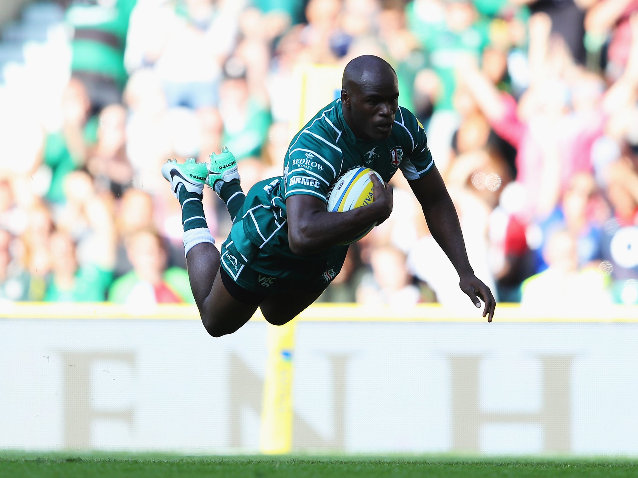 Topsy Ojo scored the opening try as London Irish beat Harlequins 39-29 on their return to the Premiership