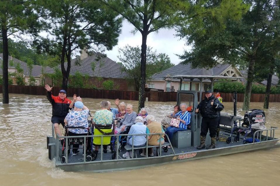 Norbert Ramon (pictured far right) has helped rescue storm survivors in Houston