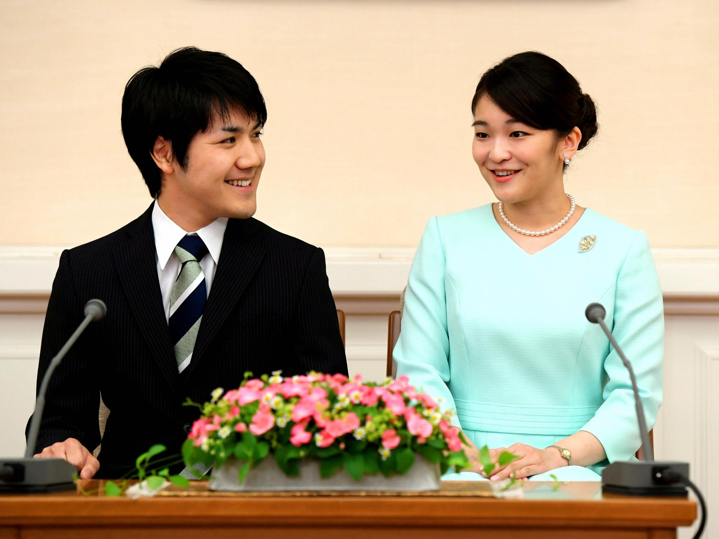 File: Princess Mako (R) and her boyfriend Komuro Kei in Tokyo, Japan