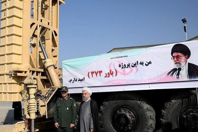 Iranian President Hassan Rouhani, and former defence minister Brigadier General Hussein Dehqan on a tour of the Bavar 373 facility in August 2016