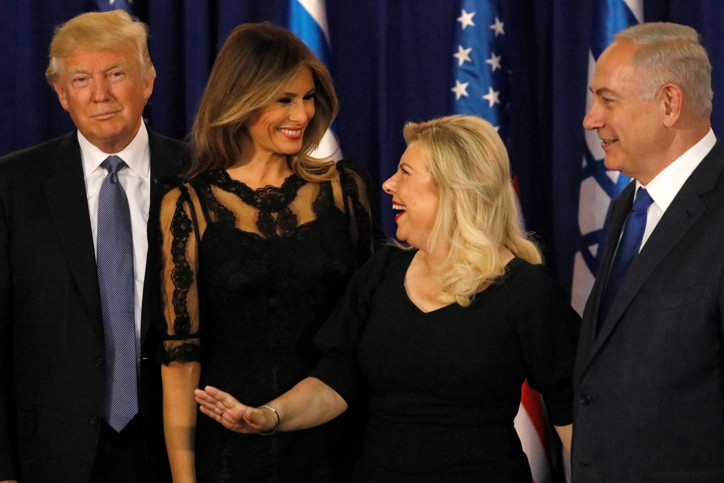 Melania Trump (2nd L) and Sara Netanyahu (2nd R) walk onstage with their respective husbands, US President Donald Trump (L) and Israel's Prime Minister Benjamin Netanyahu (R), before a dinner at the Netanyahus' residence in Jerusalem on 22 May 2017