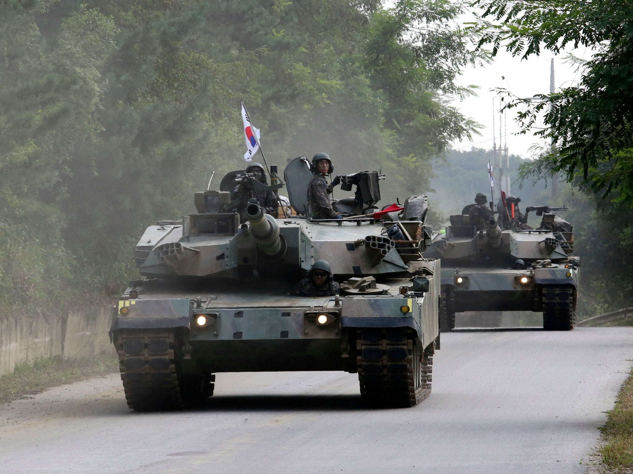 South Korean army K-1 tanks move during a military exercise in Paju, South Korea, near the border with North Korea