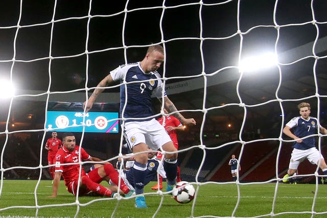 Leigh Griffiths was on hand to double Scotland's lead