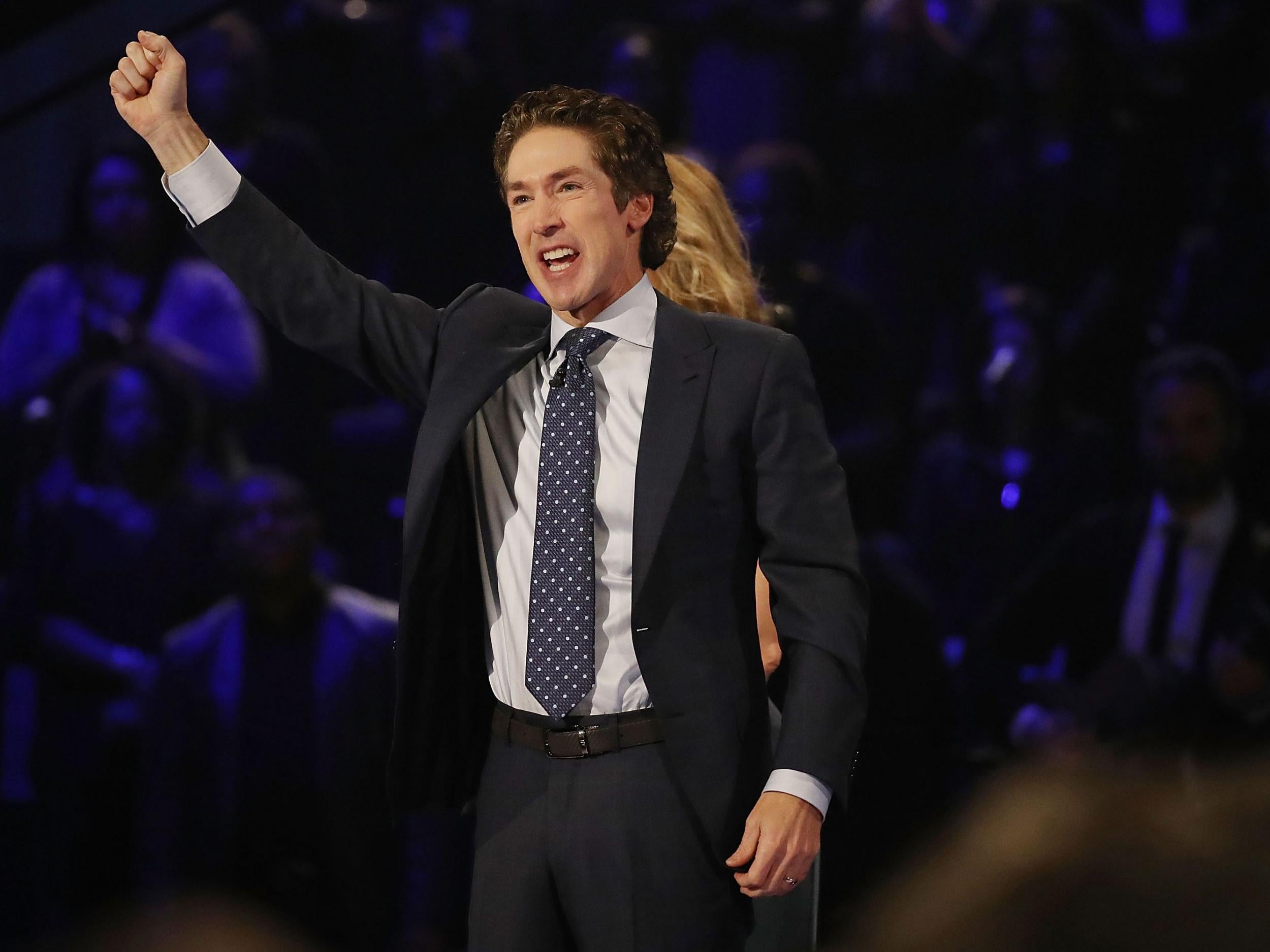 Joel Osteen, the pastor of Lakewood Church, conducts a service at his church as Houston starts the process of rebuilding