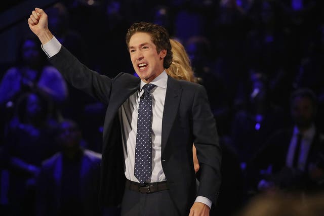 <p>Joel Osteen, the pastor of Lakewood Church, conducts a service at his church as Houston starts the process of rebuilding</p>
