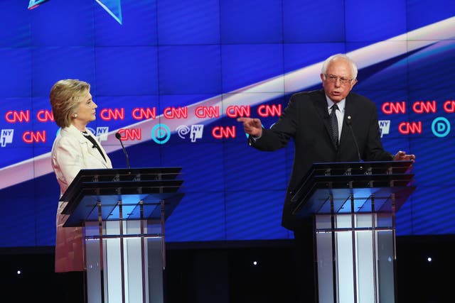 Democratic Presidential candidates Hillary Clinton and Sen. Bernie Sanders (D-VT) debate during the CNN Democratic Presidential Primary Debate at the Duggal Greenhouse in the Brooklyn Navy Yard on April 14, 2016