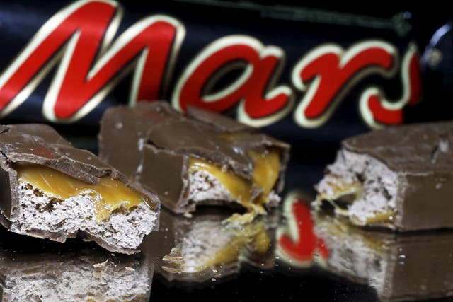 The maker of Mars bar commits to curbing climate change despite a shift in tone from US policy