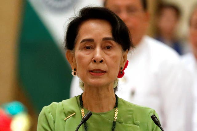 Burma's State Counselor Aung San Suu Kyi speaks during a news conference with India's Prime Minister Narendra Modi in Naypyitaw