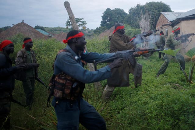 Rebels fighting government troops in Kaya, South Sudan, last month