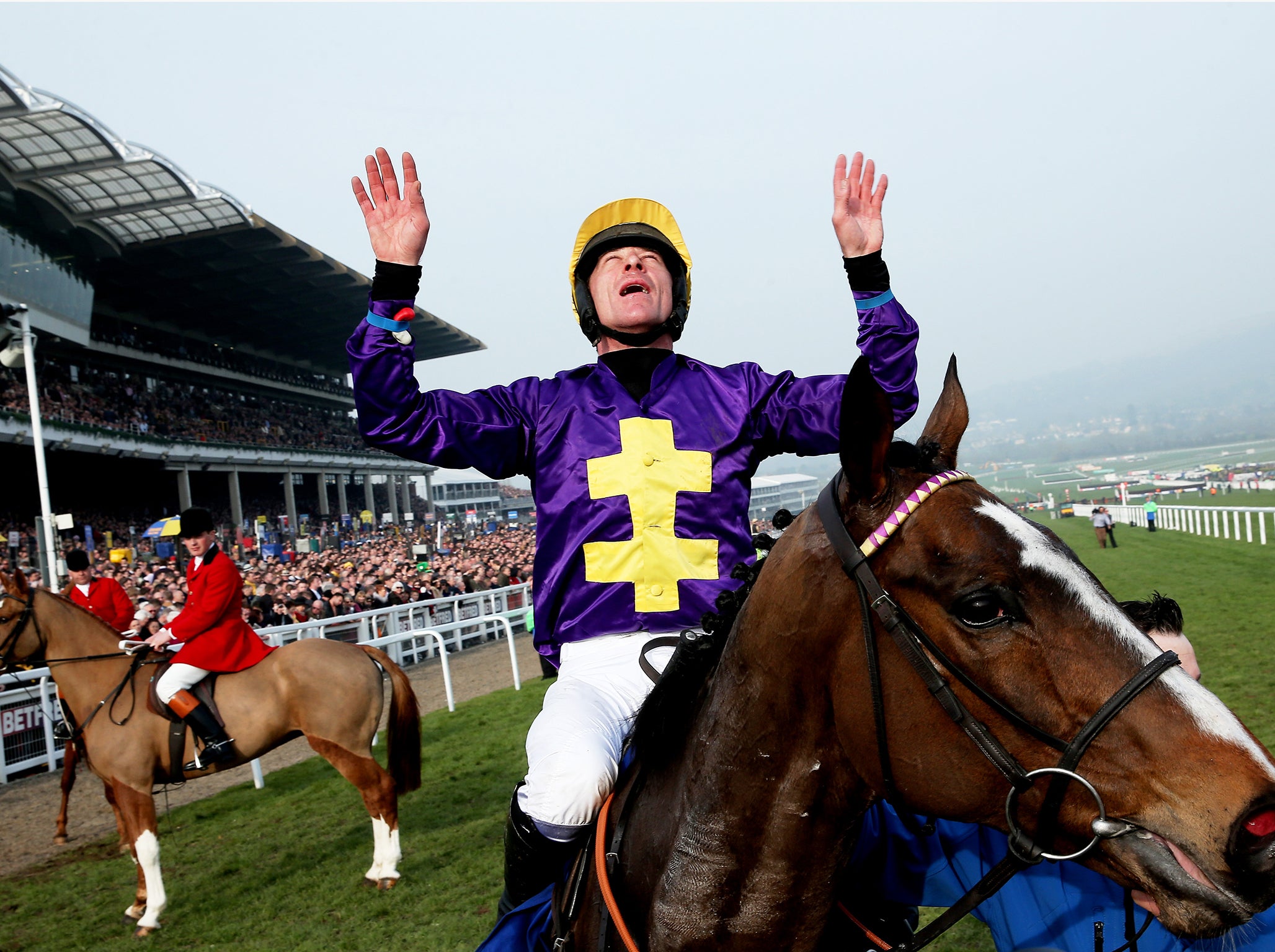 Russell celebrates after victory in the Betfred Cheltenham Gold Cup Chase