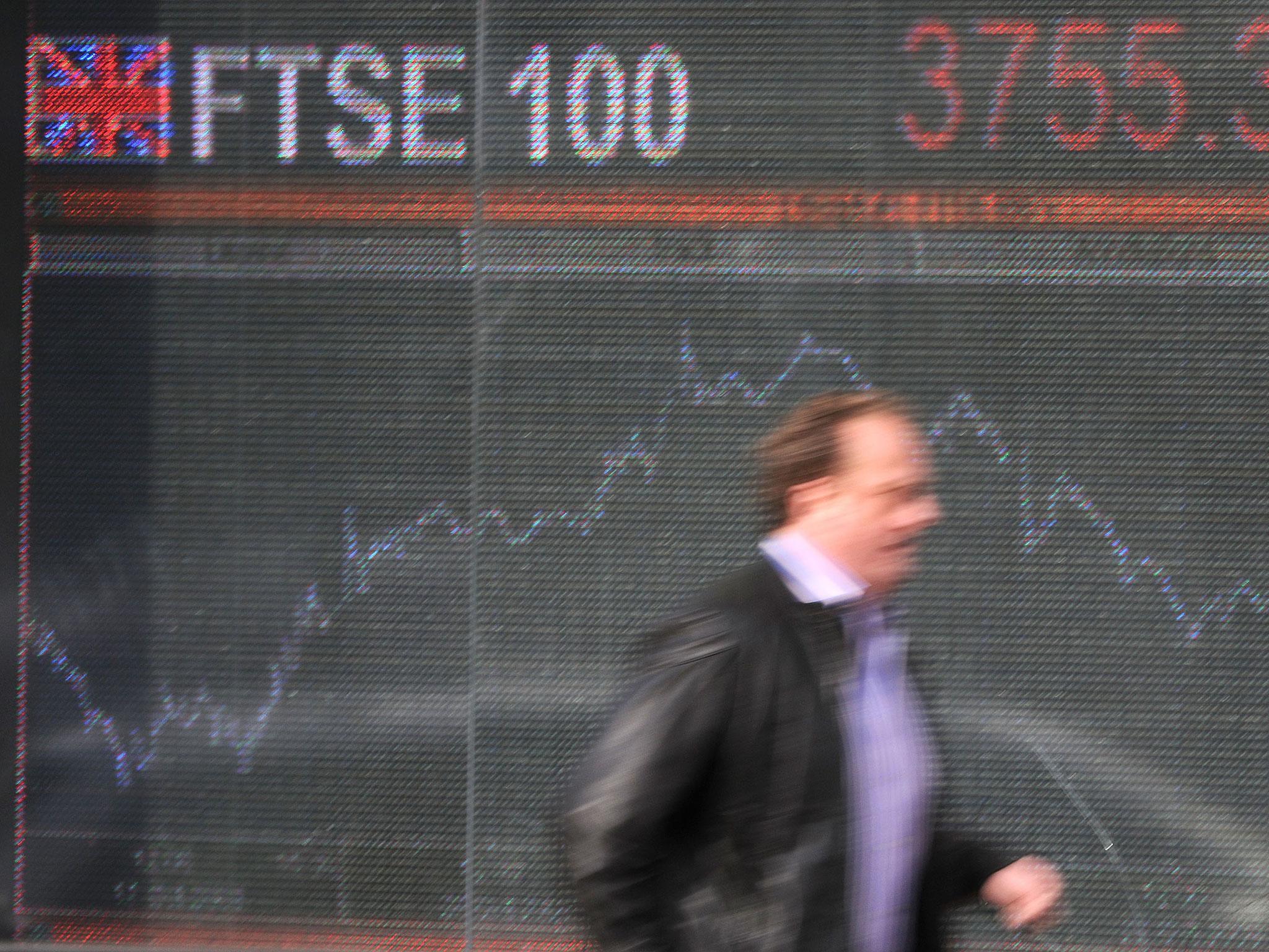 London shares edged higher but stay close to flatline as Covid fears linger on