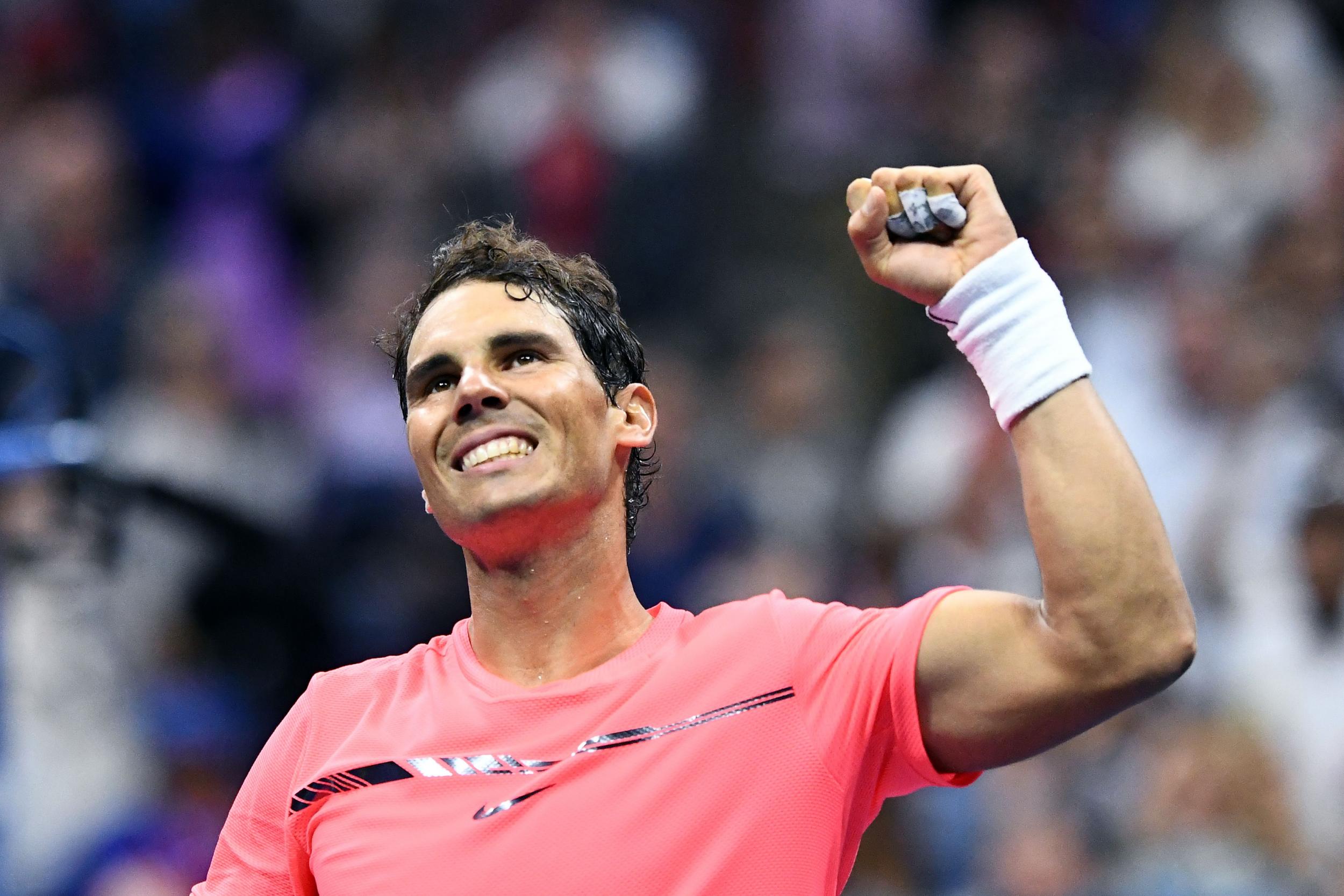 Rafa Nadal celebrates after securing his place in the semi-finals