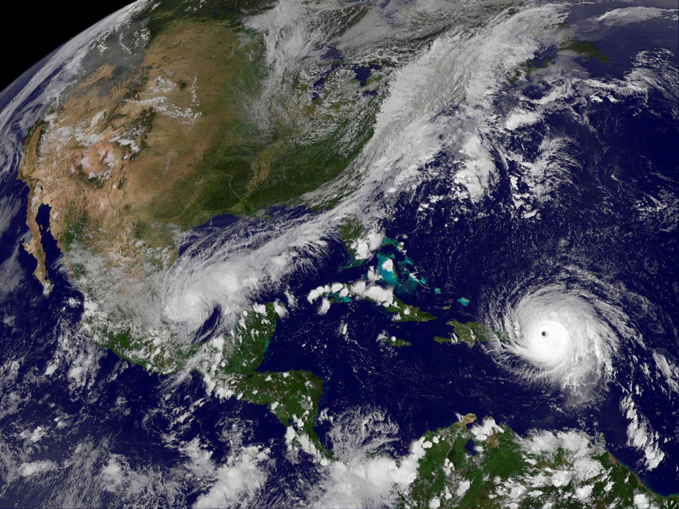 Hurricane Irma churns across the Atlantic Ocean past Puerto Rico over Dominican Republic in this Nasa satellite image