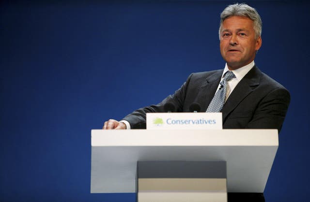 Alan Duncan addresses delegates at the Bournemouth International Centre during the annual party conference