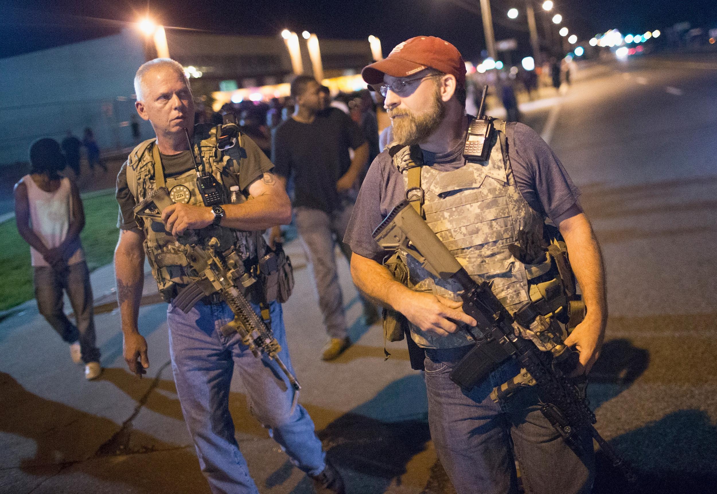 The Oath Keepers, a right-wing militia group, march in Ferguson, Missouri on the anniversary of Michael Brown’s death (Getty)