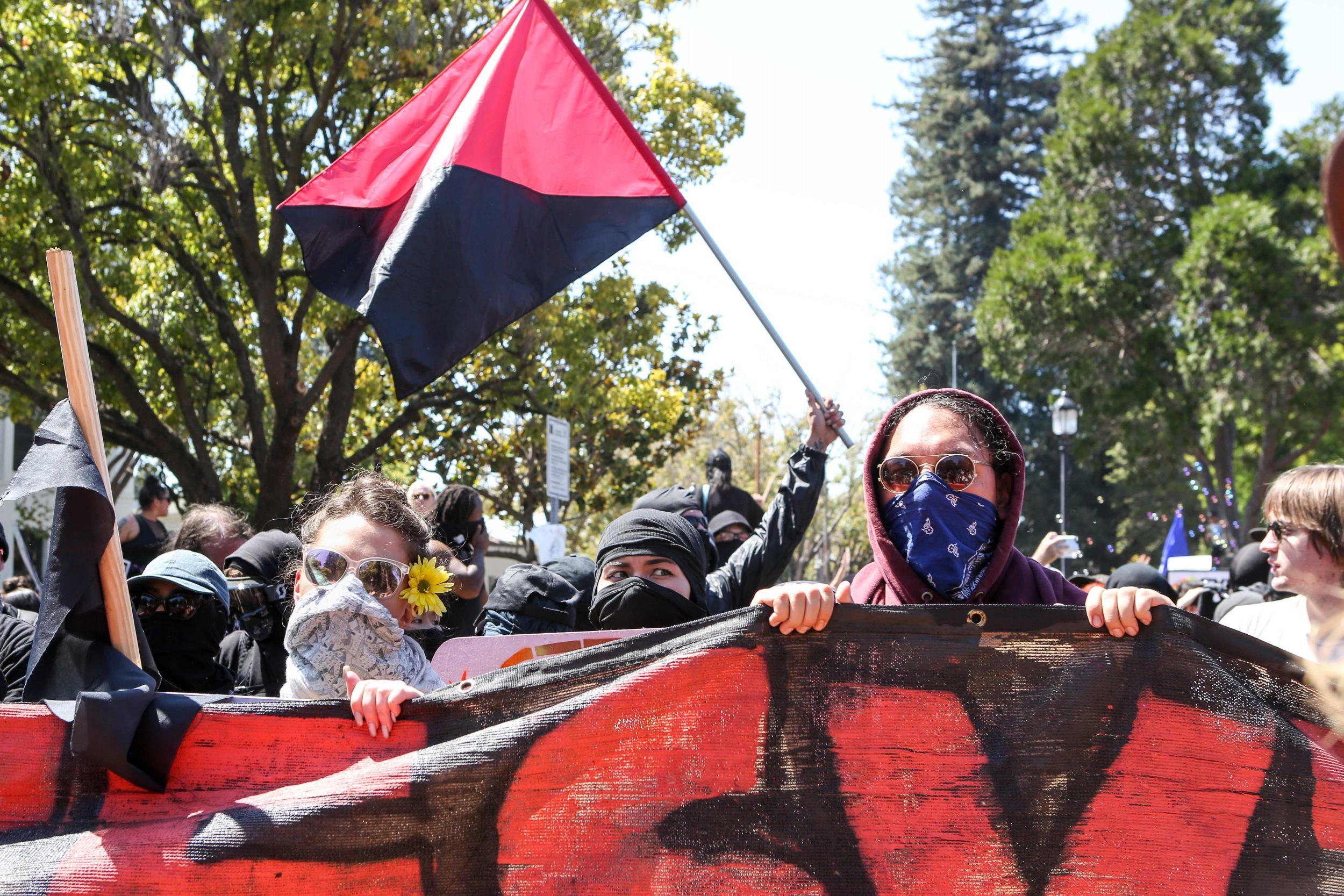 Antifa members and counter protesters gather during a right-wing No-To-Marxism rally (AFP/Getty)