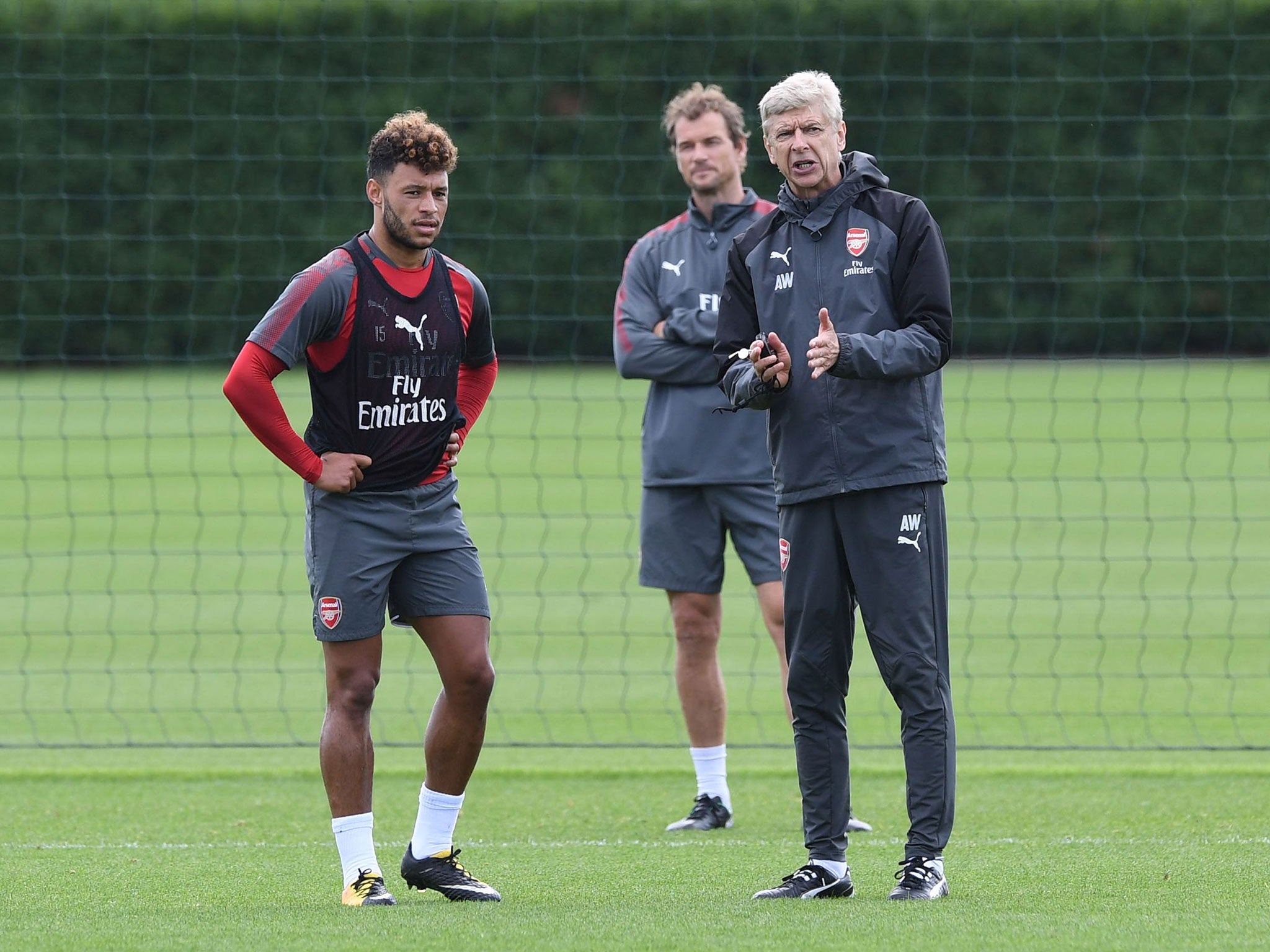Arsene Wenger and Alex Oxlade-Chamberlain during their time together at Arsenal
