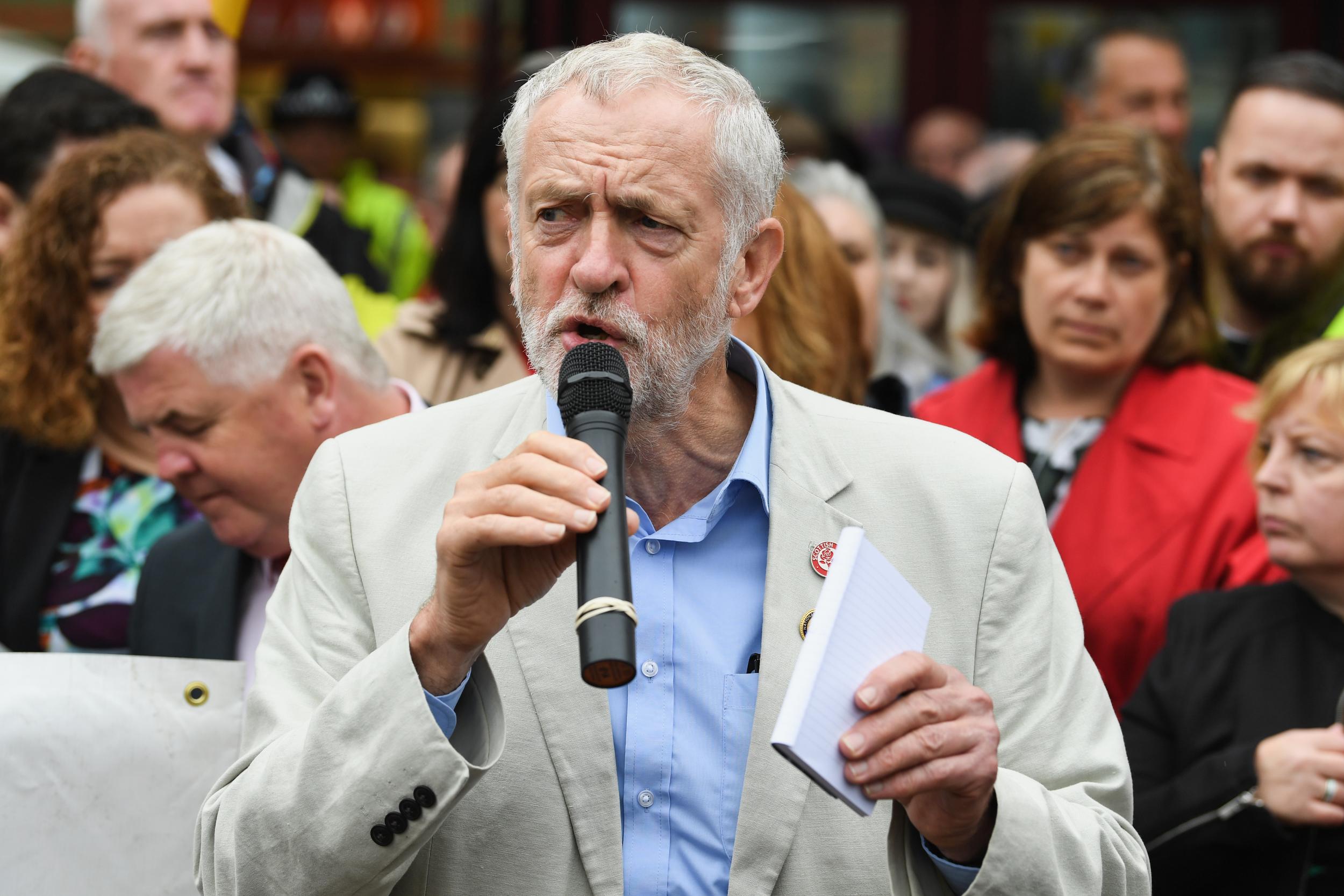 Jeremy Corbyn speaks to supporters on tour earlier his summer