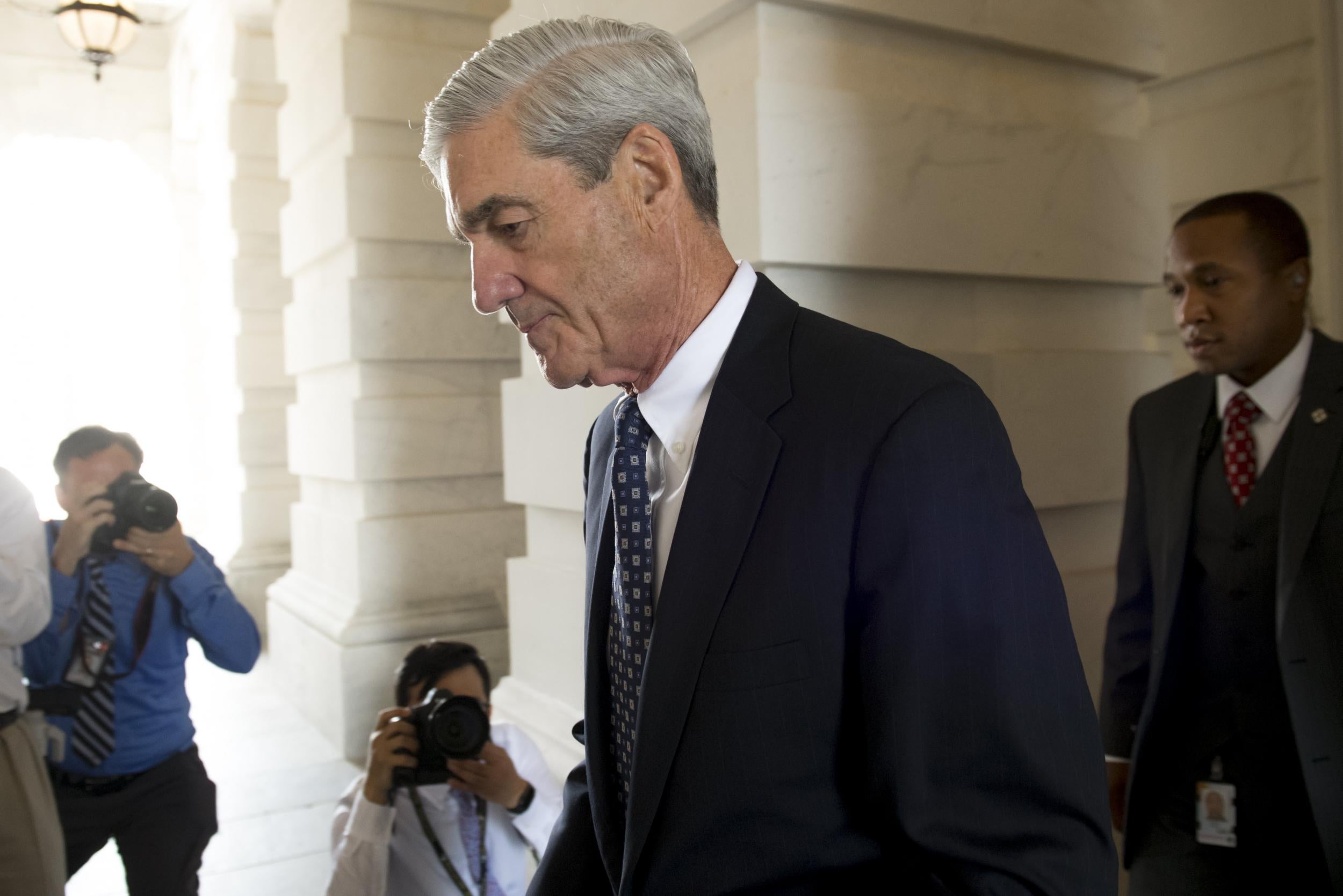 Former FBI Director Robert Mueller, special counsel on the Russia investigation, leaves Capitol Hill following a meeting with members of the US Senate Judiciary Committee