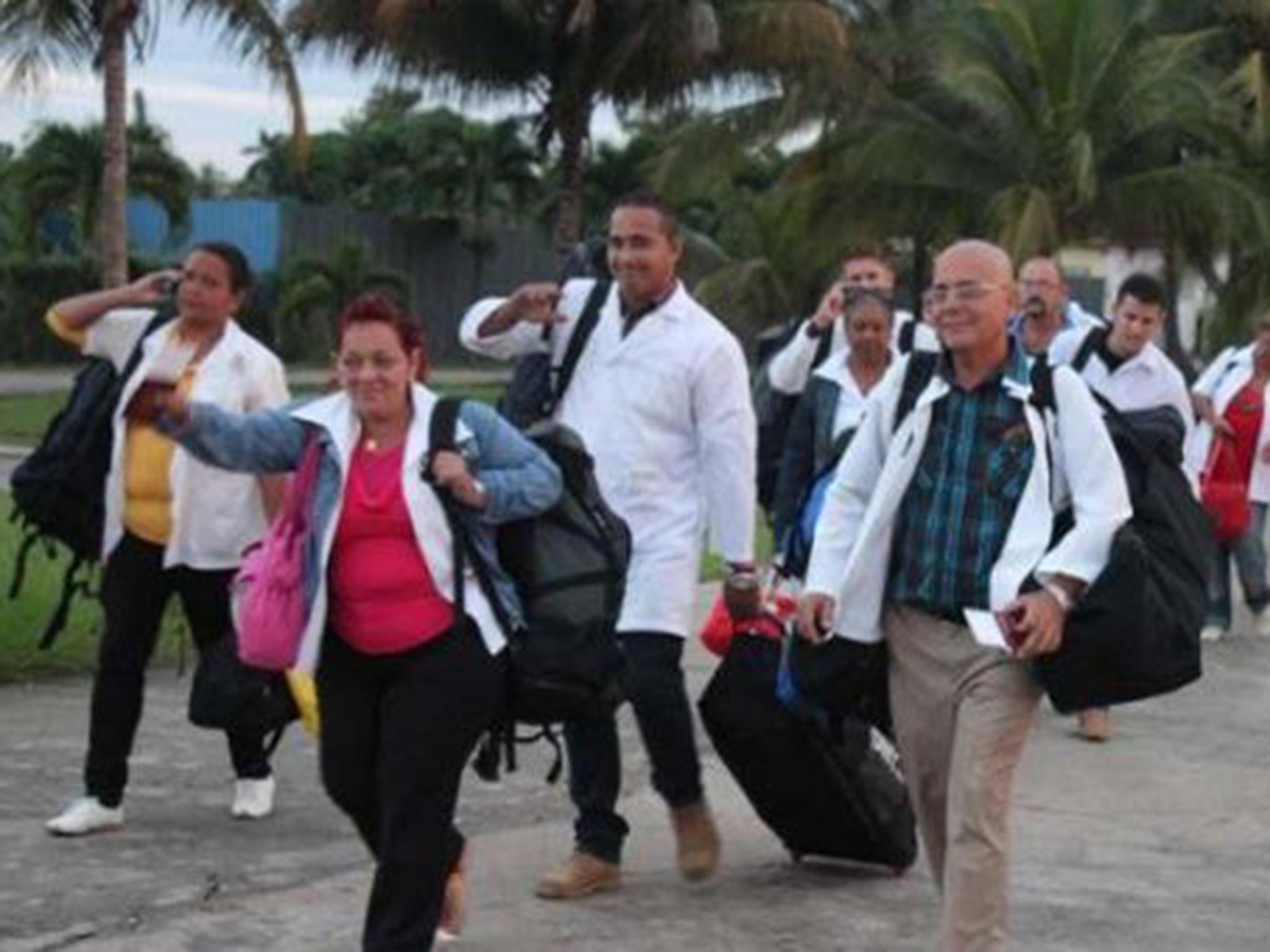 Cuban doctors on a trip to Dominica to help after Tropical Storm Erika