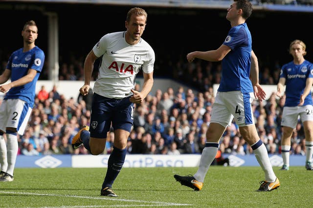 Harry Kane celebrates scoring his second for Tottenham