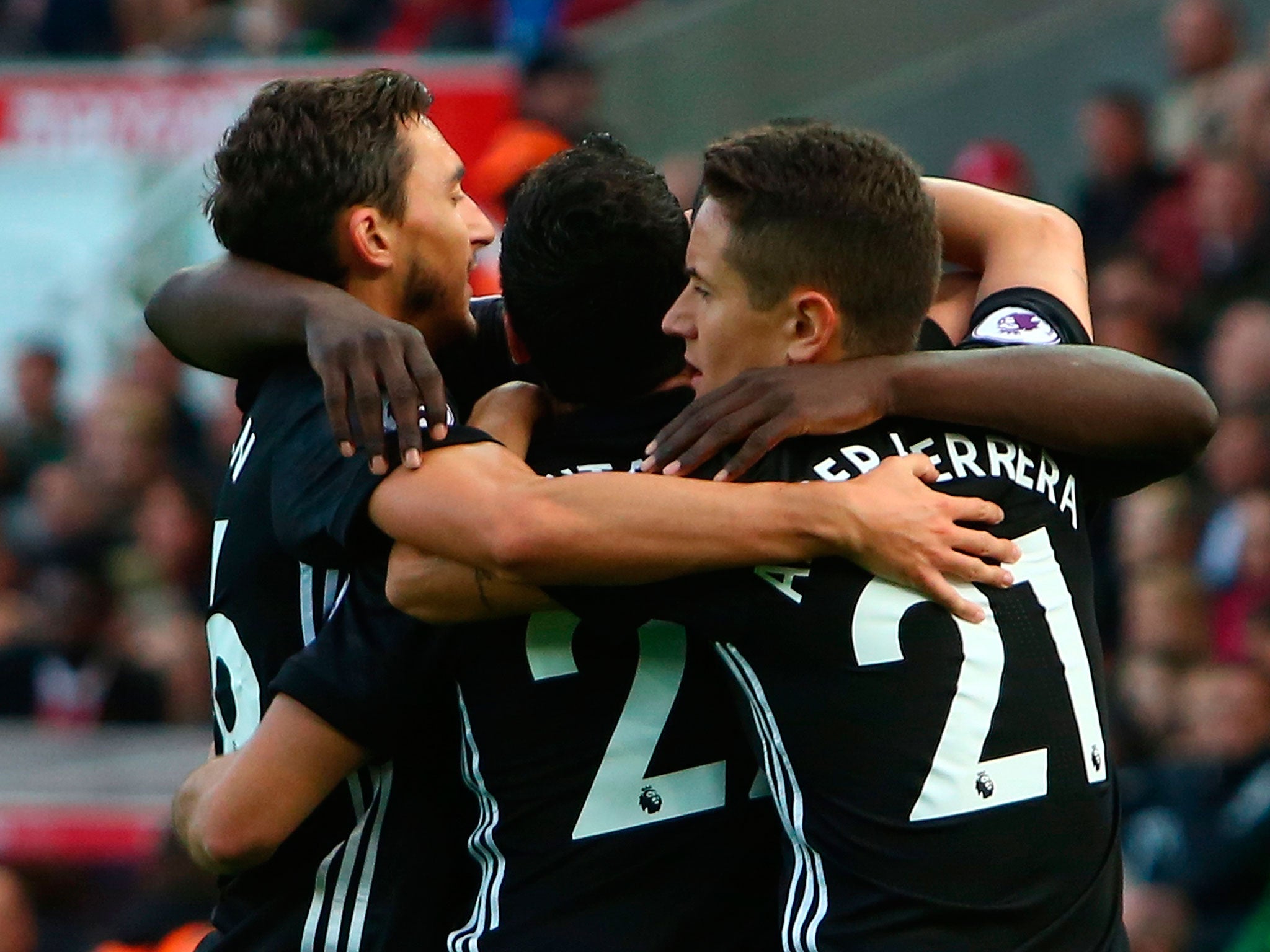 United's players celebrate their equaliser