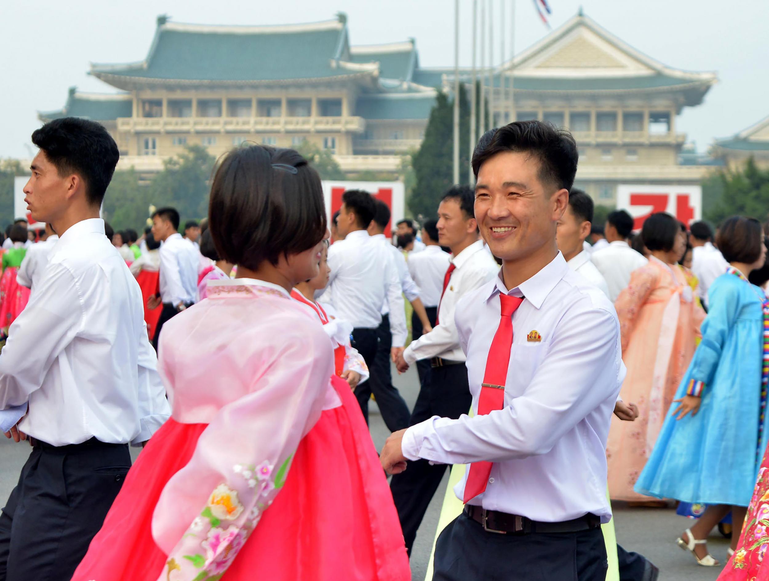 North Korean youth during a dance party in Pyongyang celebrating the 69th anniversary of North Korea's national day