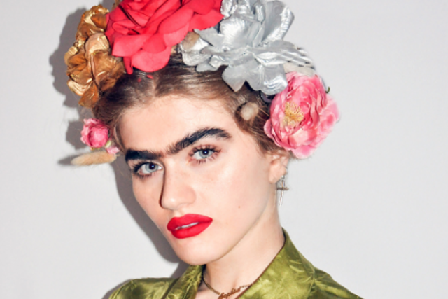 A model has become an Instagram sensation after posting pictures of her thick, dark unibrow