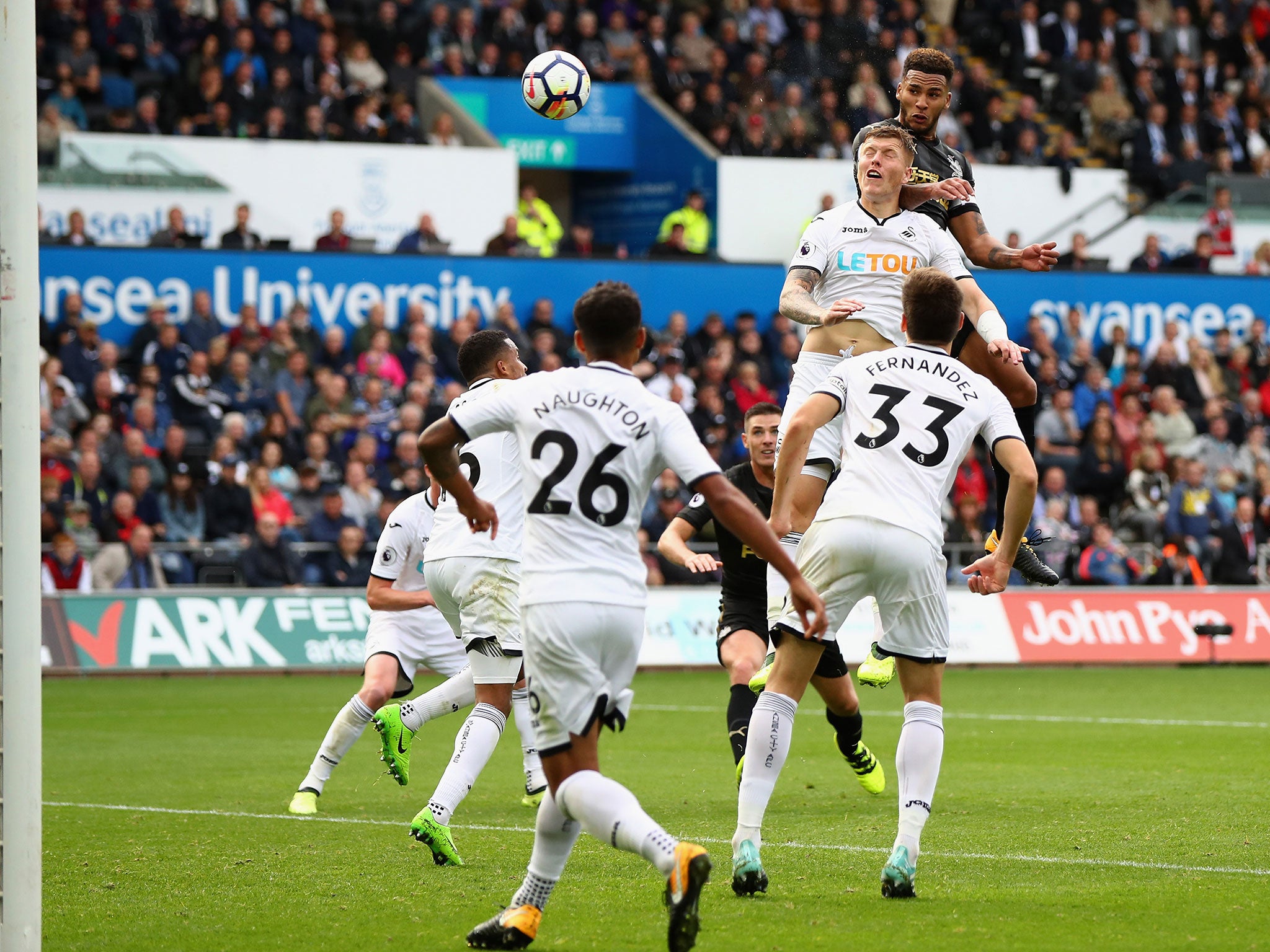 Jamaal Lascelles rises highest to score Newcastle's winning goal