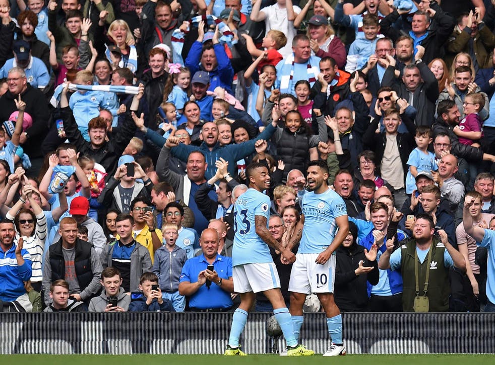 The two players celebrate Gabriel Jesus' second goal for City