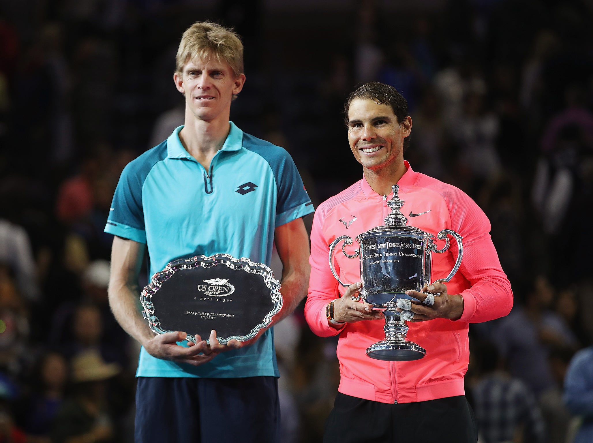 Anderson and Nadal stand together during the trophy presentation