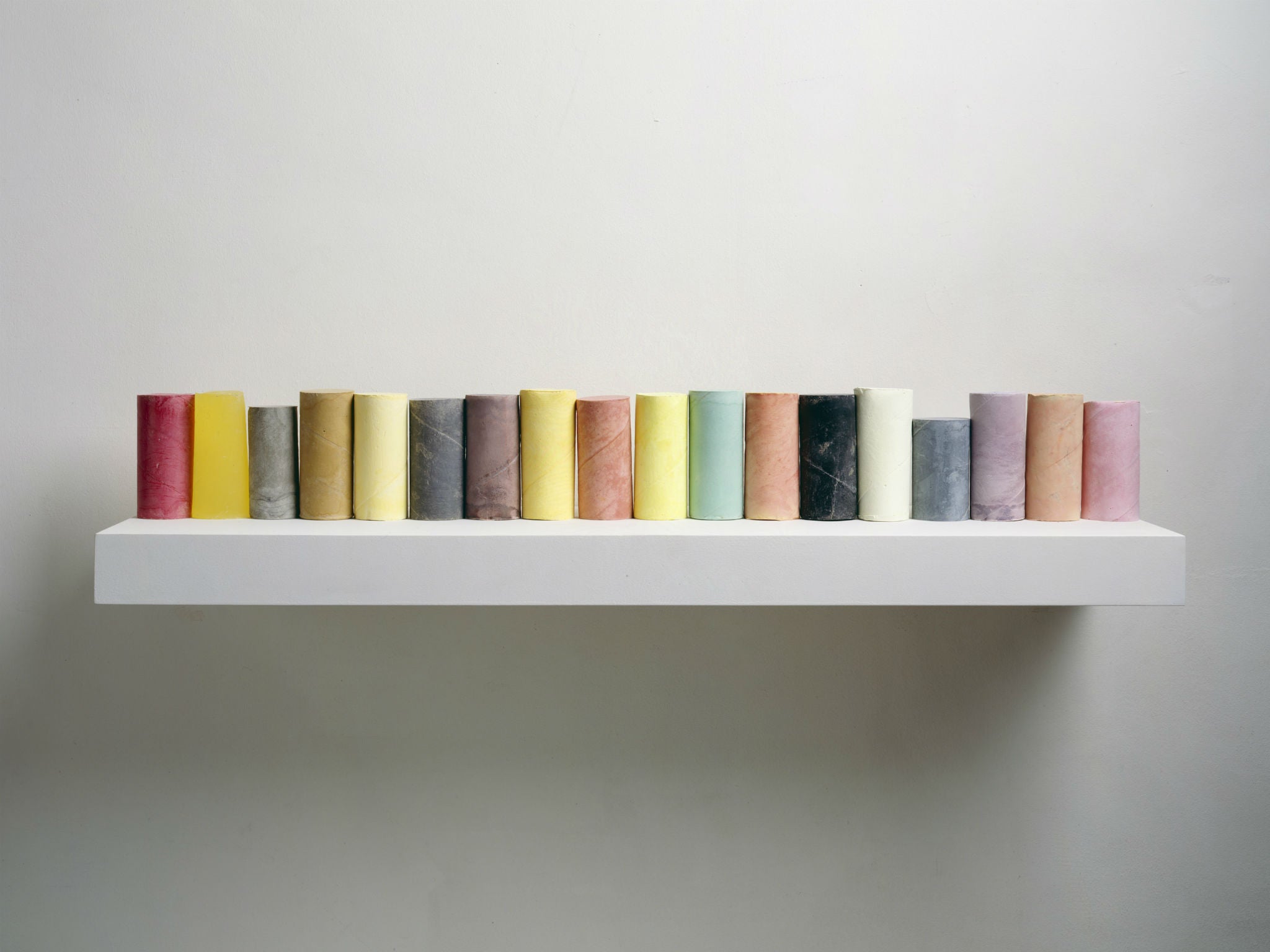 ‘Line Up’, 2007-8. Plaster, pigment, resin, wood and metal (18 units, one shelf) (? Rachel Whiteread Photo: courtesy the artist and Mike Bruce)