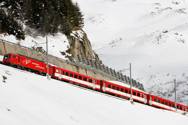 A train of the Matterhorn-Gotthardbahn railways drives up the Oberalbpass near the central Swiss town of Andermatt